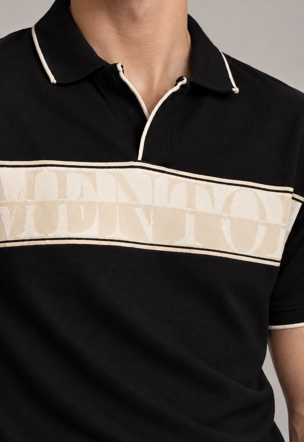 Black Polo with Crest Stripe