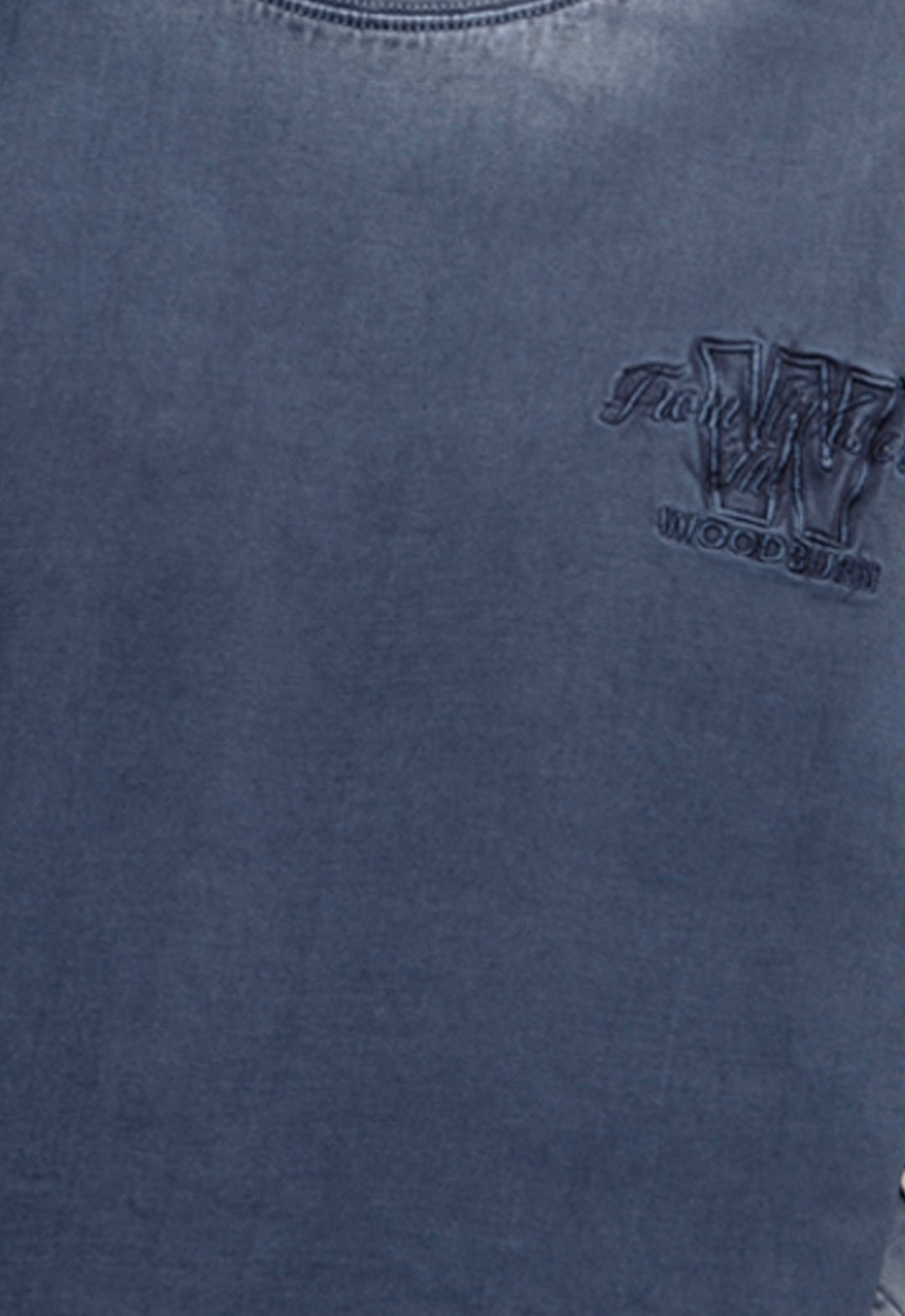 Close-up of a blue garment with a logo on the chest.